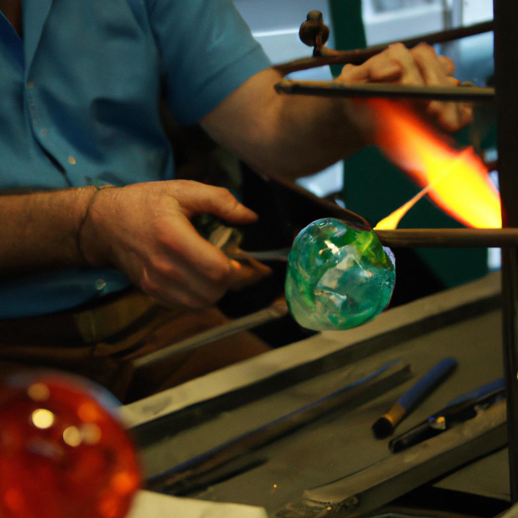 Person creating glass art masterpiece