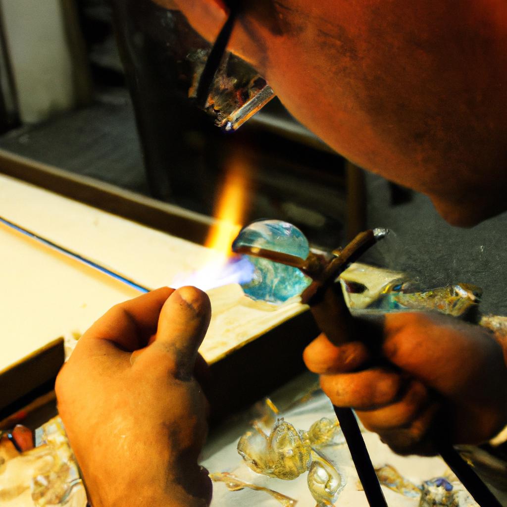 Person sculpting glass artwork